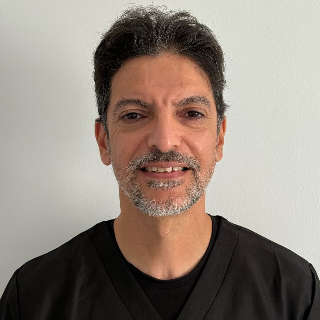 Dr. Khouazem